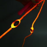 Bouton power de la corde à sauter lumineuse à LED orange